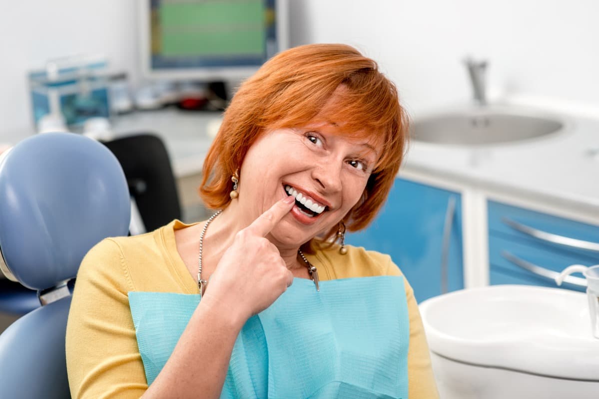 Can a Dental Crown Be Thinned Down If It Feels Like It Is Pushing Against the Adjacent Tooth?